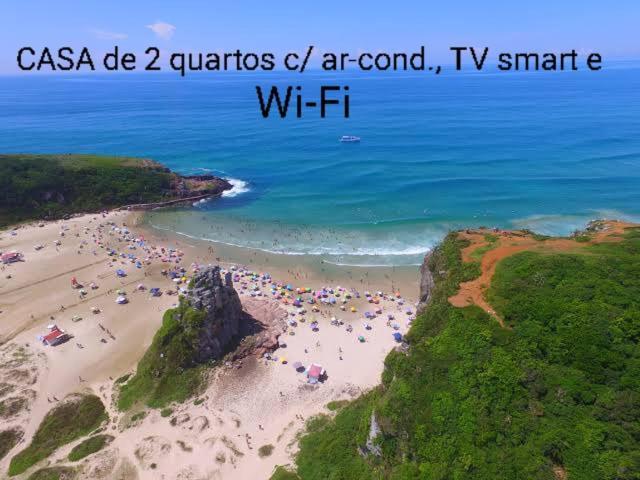 Casa De 2 Quartos Com 2 Ares-Condicionados Em Torres-Rs - Na Mais Bela Praia Gaucha - Cozinha - Banheiro - Tv Smart 32 E Wi-Fi - Estacionamento - Anfitria Superhost No Bnb Villa Buitenkant foto